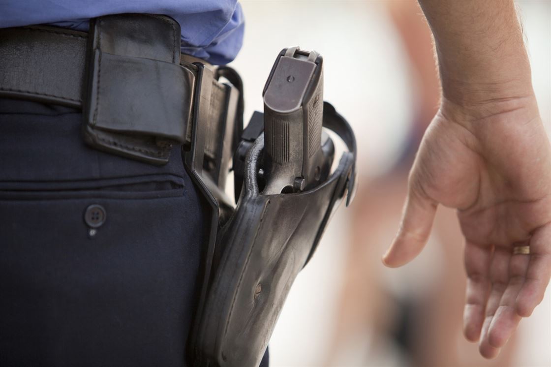 A close-up of a police officer's holster
Description automatically generated